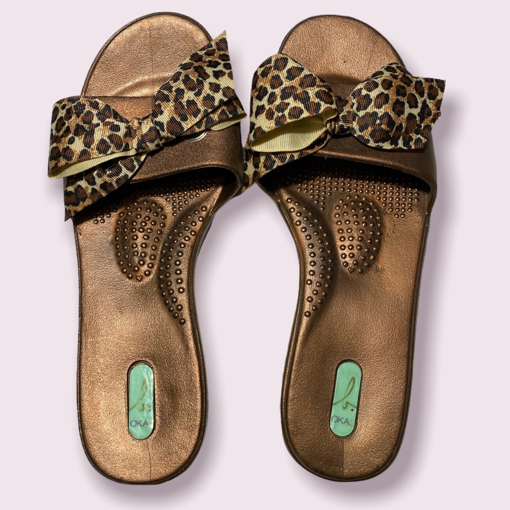 OKA B. Copper flat slides with leopard print bow
